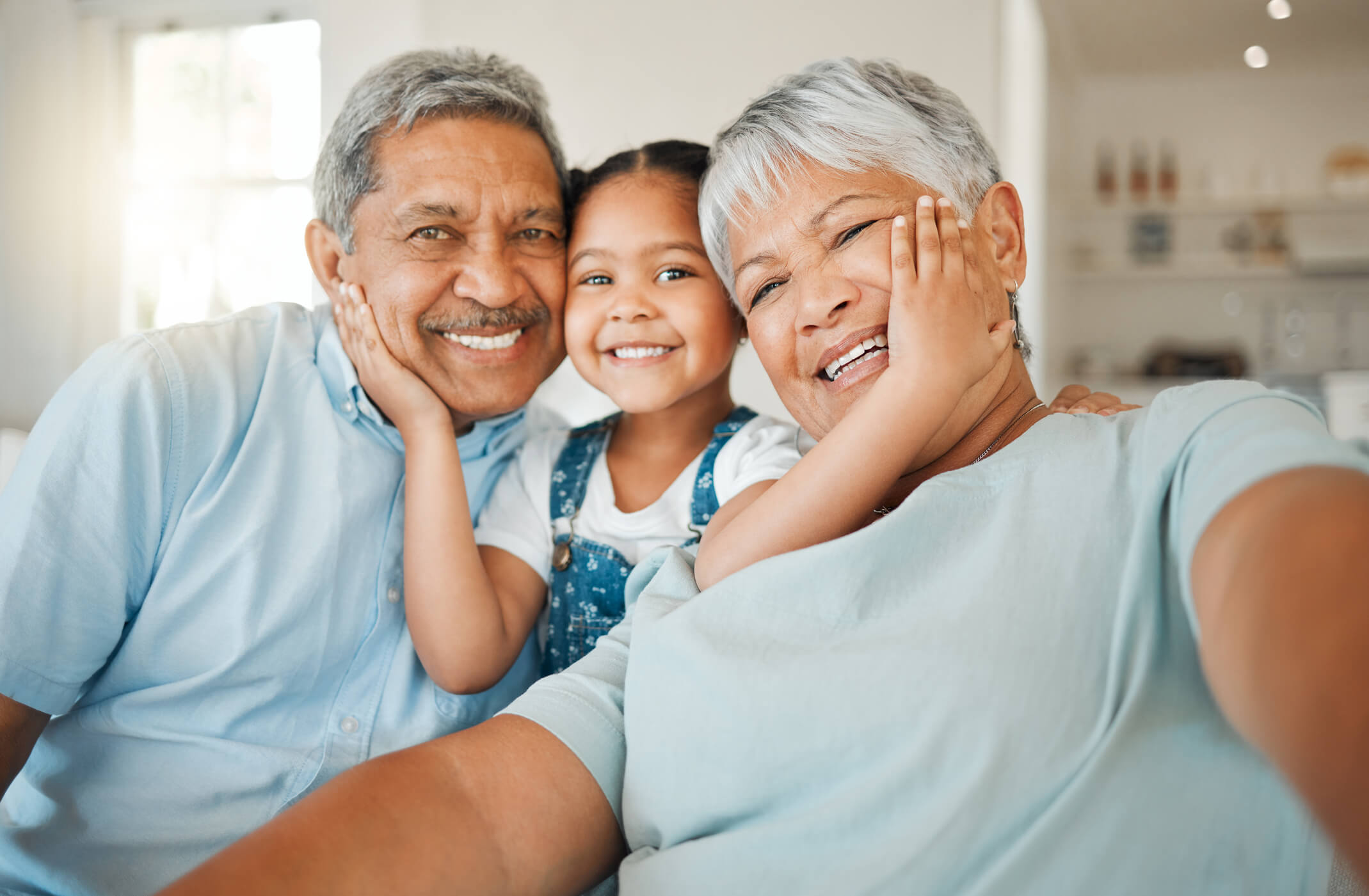 A smiling retired couple who are covered by Young's Insurance